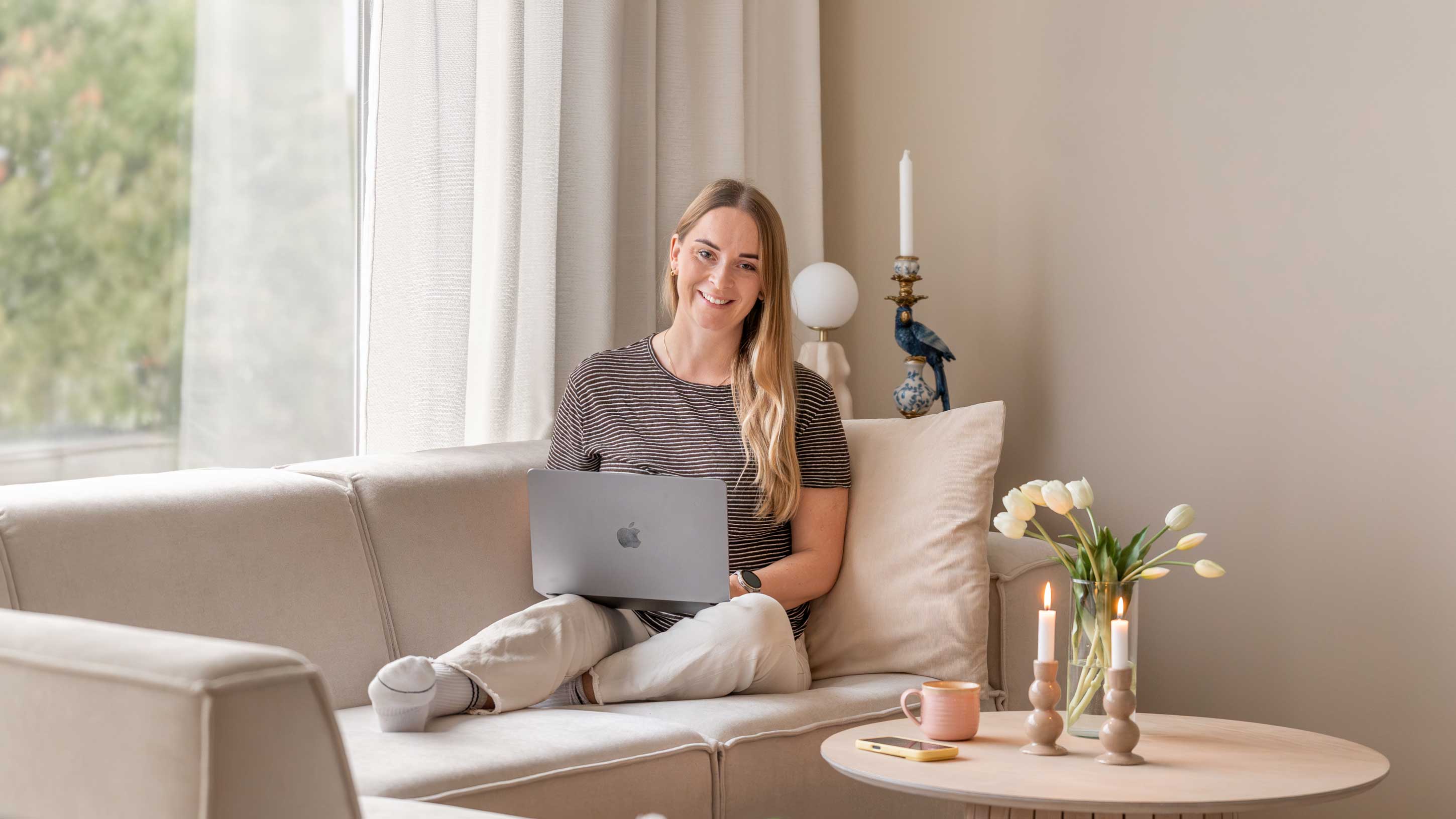 Student studying online with a laptop at home